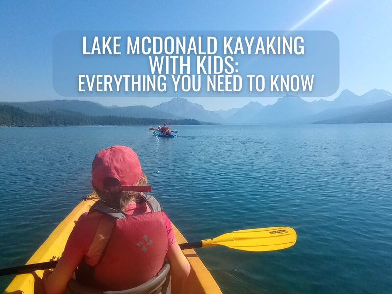 My daughter on Lake McDonald kayaking with the rest of our family in kayaks in the background.