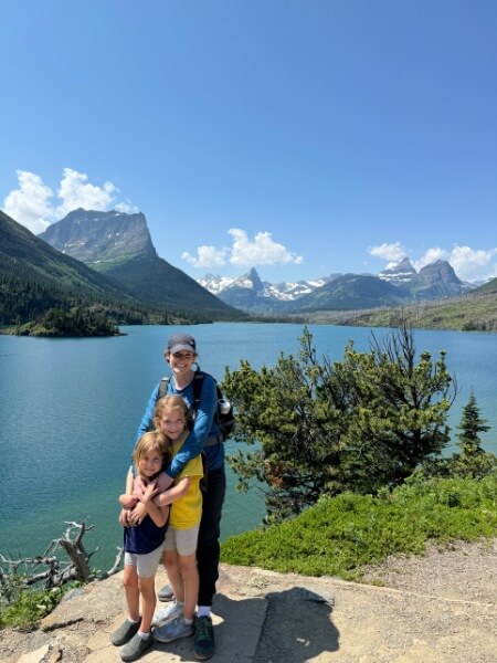 Me with my two daughters with Saint Mary Lake behind us at the Sun Point Nature Trail