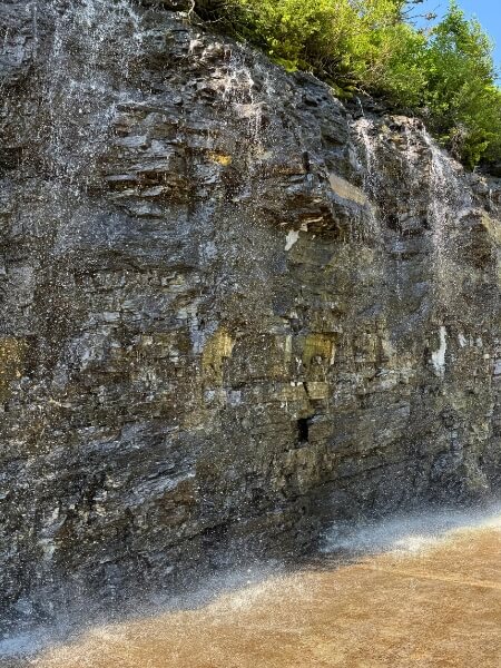 Water flowing down the Weeping Wall along Going to the Sun Road in Glacier National Park.