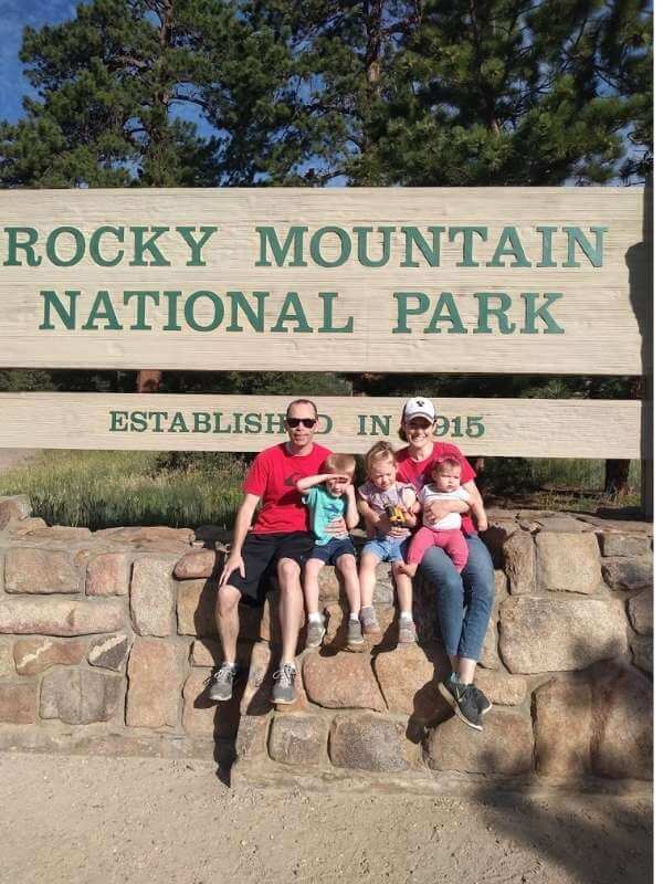 My family in front of the entrance sign to Rocky Mountain National Park