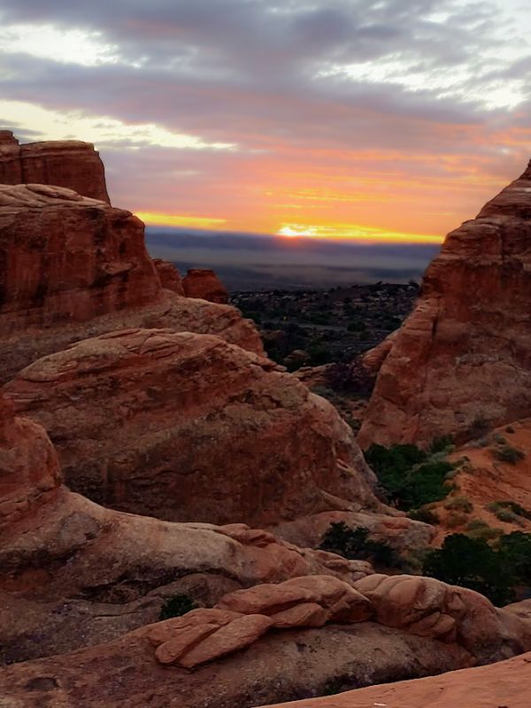 Sunset at Arches National Park from an overlook at Devils Garden Campground